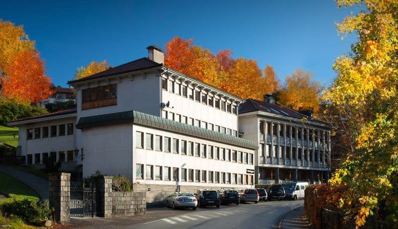 The Reksten building in autumn sunlight